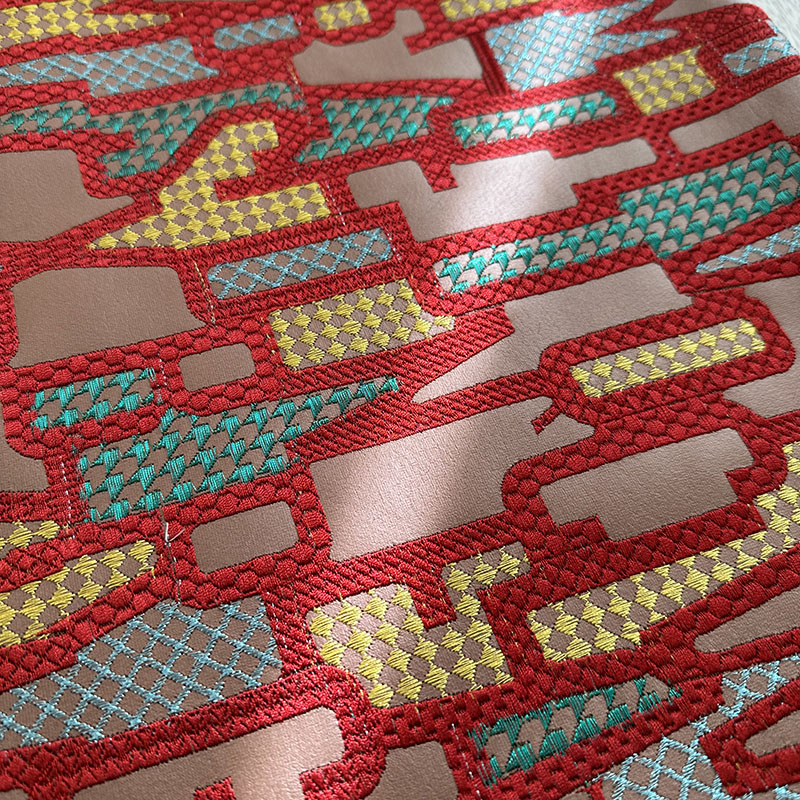 Copy leather embroidered fabric